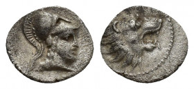 Pamphylia, AR Obol Side ca. 400-380 BC. 0.7g 9.9mm Head of lion right / Helmeted head of Athena right.