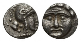 Pisidia, Selge, Obol, 0.7gr, 8.8mm. 350-300 BC Obverse: facing gorgoneion Reverse: head of Athena in corynthian helmet right astragalos to left
