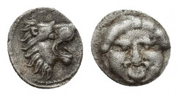PAMPHYLIA. Aspendos. Obol (Circa 460-360 BC). 0.4g 8.6mm Obv: Facing gorgoneion, tongue protruding. Rev: Head of lion right.
