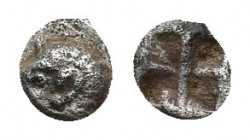 Teos, late 6th-early 5th century BC. AR Hemitartemorion (4.5mm, 0.1g). Head of griffin ? r. R/ Quadripartite incuse square.