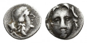 Pisidia, Selge, Obol, 0.9gr, 9.7mm. 350-300 BC Obverse: facing gorgoneion Reverse: head of Athena in corynthian helmet right astragalos to left