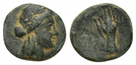 ionia. Smyrna . ΜΕΝΕΚΡΑΤΗΣ, magistrate 75-50 BC. Bronze Æ 12.3mm., 2,1g. Laureate head of Apollo right / ΖMVP MENE, hand in caestus.