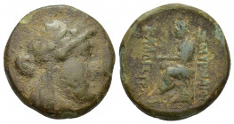 Ionia, Smyrna Æ Homereion. 8.9g 21.2mm Laureate head of Apollo right / Homer seated left, holding scroll, transverse sceptre behind; ZMYPNAIΩN to righ...