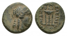 Seleukid Kingdom. Bronze Æ 10.3mm., 1.5g. Laureate head of Apollo right / BAΣIΛEΩΣ ANTIOXOY, tripod,