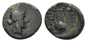 Smyrna, AE10, civic issue, 190-170 BC. 1.1 g 10.4mm Magistrate Homeros. Laureate head of Apollo right. / ZMYΡ OMH, lyre or chelys.