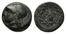 AIOLIS, Elaia. After 340 BC. Æ 10.8mm. 1.1 gr. Head of Athena left in Corinthian helmet / Grain-seed within olive-wreath.