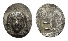 IONIA, Kolophon. Circa 500-450 BC. AR Tetartemorion (7.1mm, 0.1g). Facing head of Apollo / TE monogram within incuse rectangle.