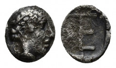 Ionia - Kolophon - Autonomous Tetartemorion 490-400 BC. 0.3g 6.5mm Obv: head of Apollo right. Rev: TE monogram in incuse square.