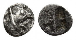 Ionia. Teos circa 550-540 BC. AR 6.2mm., 0,2g. Forepart of griffin right / Incuse square punch.