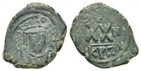 Phocas. 602-610. Æ Half Follis (19.9mm, 6.4 g). Cyzicus mint, 1st officina. Date RY 2 (603/4). Crowned bust facing, wearing consular robes, and holdin...