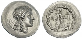 EOLIA. Mirina. Tetradracma (circa 200 a.C.). A/ Cabeza laureada de Apolo a der. R/ monograma detrás de Apolo con rama de laurel; a los pies ónfalos y ...