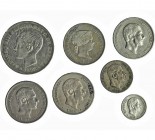 7 monedas de Manila: peso, 1897; 50 centavos de peso (4), 1868, 1881, 1882 y 1885; 20 centavos de peso, 1884; 10 centavos de peso, 1885. Calidad media...