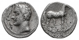Hispanic-Carthaginian Coinage. 1/4 shekel. 220-205 BC. Cartagena (Murcia). (Abh-545). Anv.: Male head left. Rev.: Horse standing right. Ag. 1,70 g. Po...