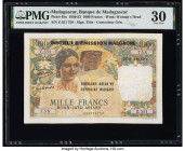 Madagascar Banque de Madagascar et des Comores 1000 Francs 9.10.1952 Pick 48a PMG Very Fine 30. Pinholes are noted on this example. 

HID09801242017

...