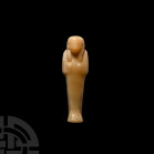 Egyptian Alabaster Shabti. New Kingdom-Late Period, 1550-332 B.C. An alabaster mummiform shabti modelled with crossed arms, stylised facial features, ...