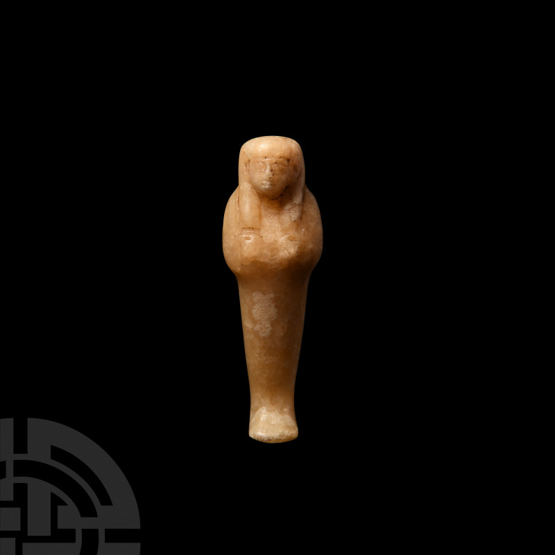 Egyptian Alabaster Shabti. New Kingdom-Late Period, 1550-332 B.C. An alabaster m...