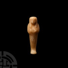 Egyptian Alabaster Shabti. New Kingdom-Late Period, 1550-332 B.C. An alabaster mummiform shabti modelled with crossed arms, stylised facial features, ...