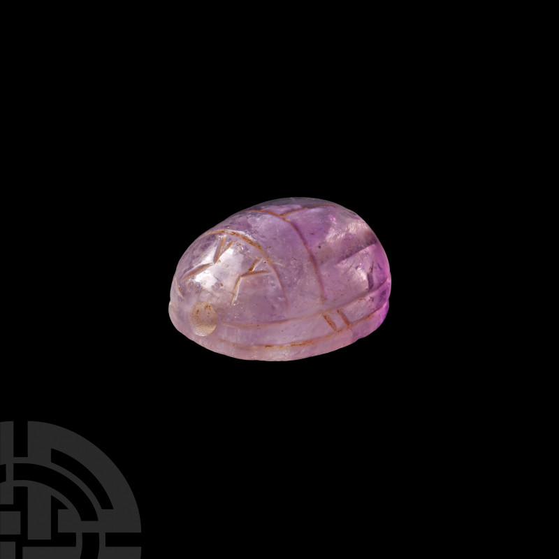 Egyptian Amethyst Scarab. New Kingdom, 1550-1070 B.C. A carved amethyst scarab w...