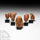 Romano-Egyptian Terracotta Head Collection. Roman Period, 30 B.C.-323 A.D. A mixed group of terracotta heads, each hollow to the reverse, comprising: ...