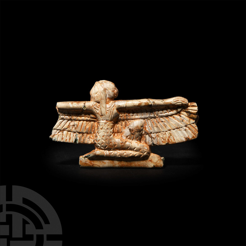 Egyptian Green Glass Winged Goddess Pectoral. Ptolemaic Period, 300-30 B.C. A fr...