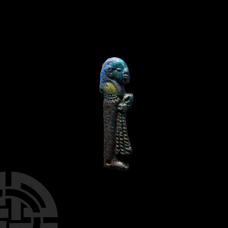 Egyptian Glazed Figural Amulet. Third Intermediate Period, 1069-702 B.C. A blue-...