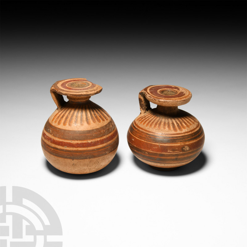 Etrusco-Corinthian Polychrome Aryballos Pair. 6th century B.C. A pair of miniatu...