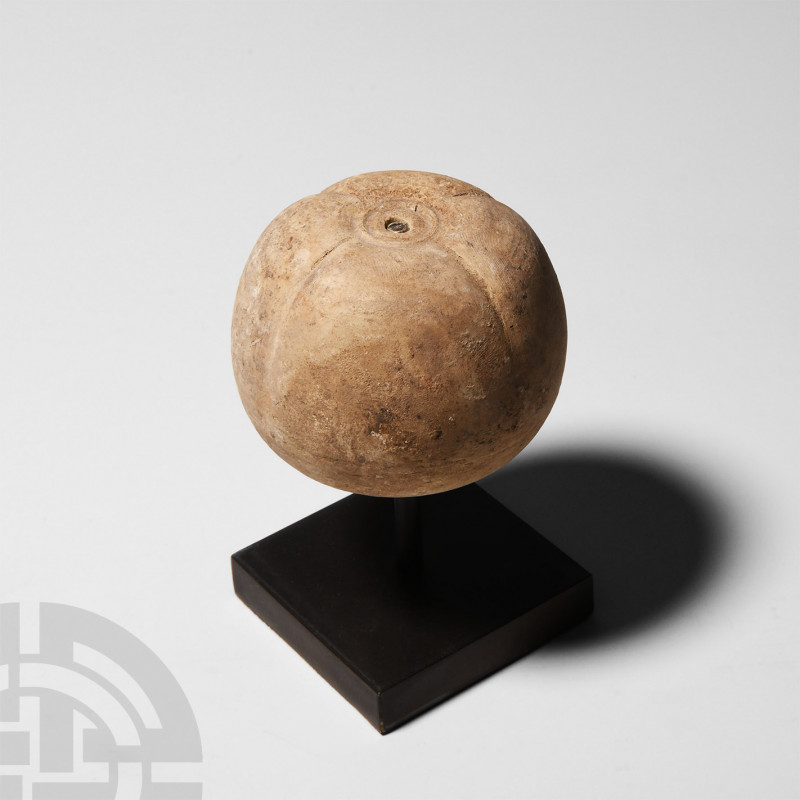 Greek Terracotta Pomegranate. 6th-3rd century B.C. A hollow terracotta pomegrana...