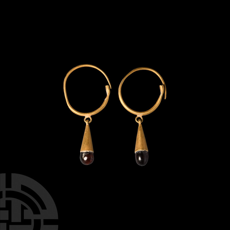 Greek Gold Garnet Drop Earrings. 5th-3rd century B.C. A matched pair of gold ear...