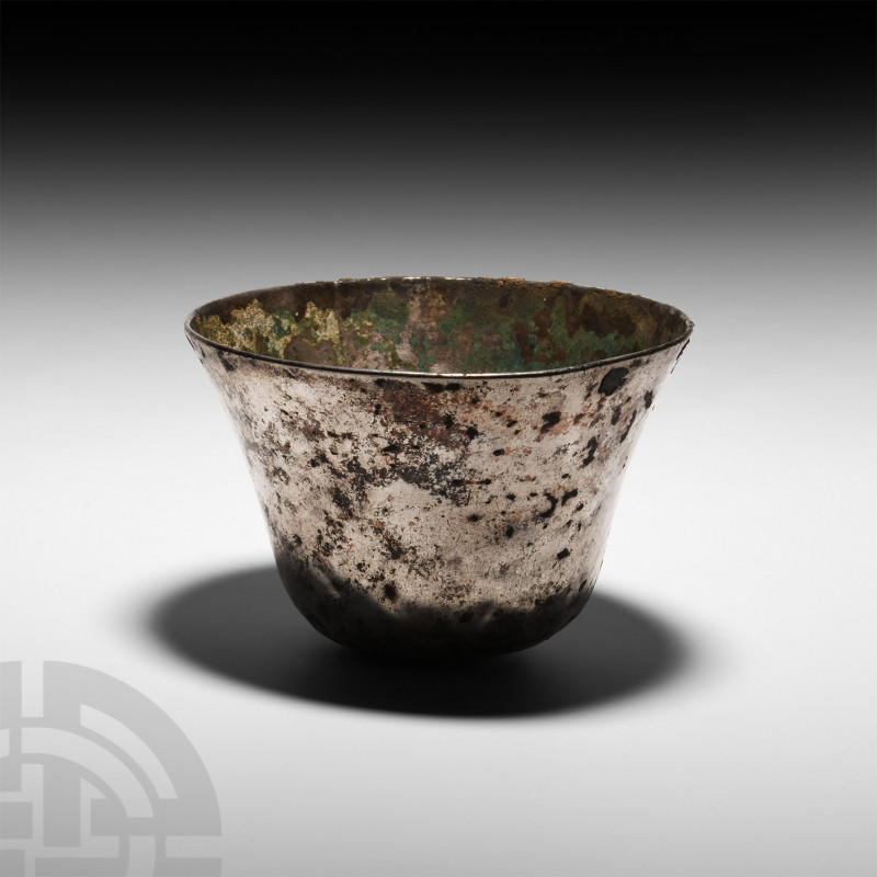 Hellenistic Flared Silver Cup. Late 2nd-early 1st century B.C. A flared silver c...