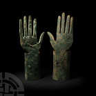 Etruscan Funerary Figure Hands. 7th century B.C. A pair of hands from a funerary figure, each formed from a hammered bronze sheet with elongated slend...