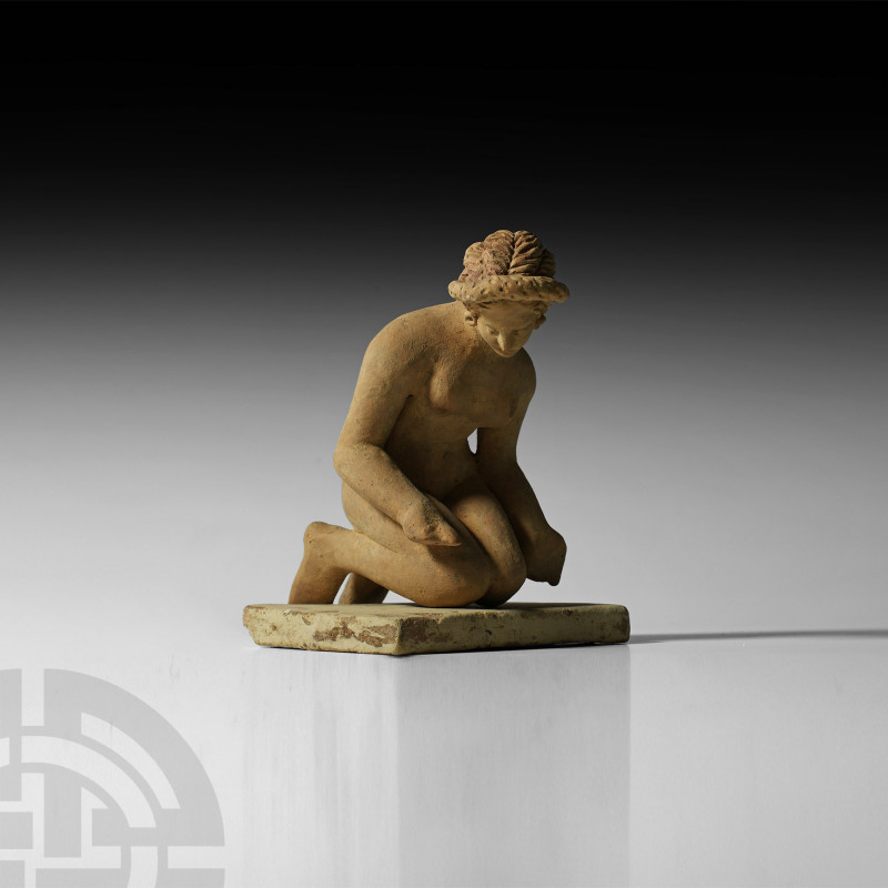 Greek Terracotta Kneeling Nude Female. 5th-3rd century B.C. or later. A nude ter...