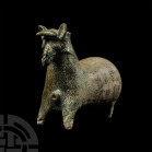 Parthian Glazed Horse Rhyton. 1st-2nd century A.D. A glazed ceramic rhyton formed as a stylised standing horse with stout forequarters and an exaggera...
