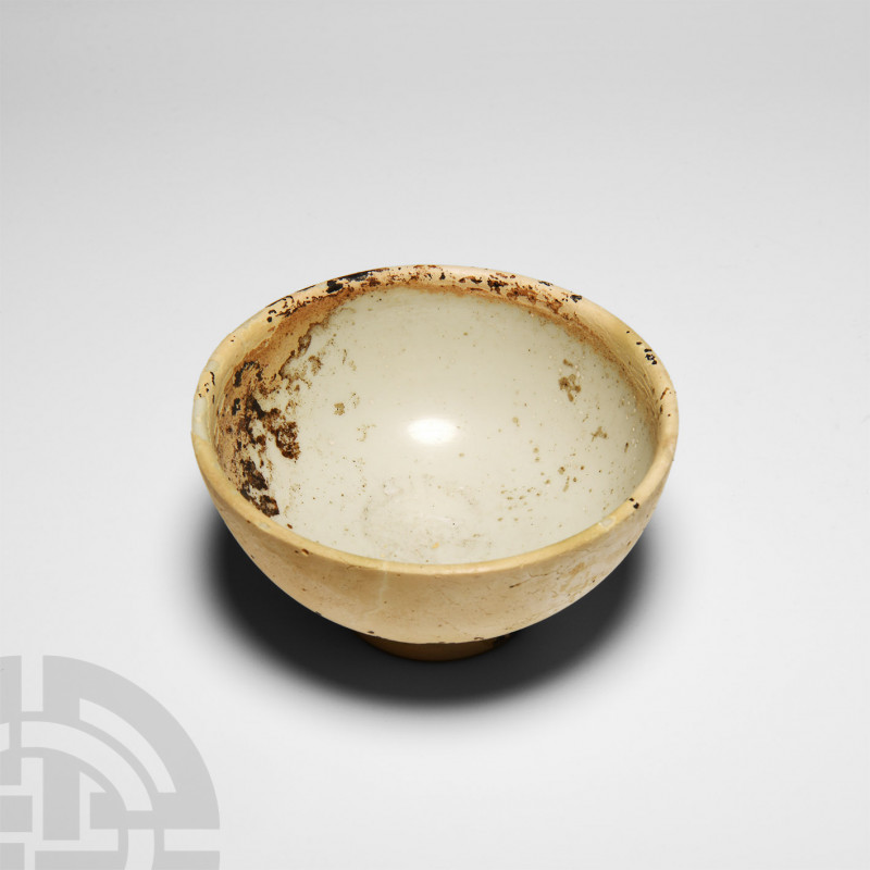Roman Cast Opaque White Glass Patella Cup. Early 1st century A.D. An opaque whit...