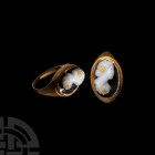 Roman Gold Ring with Cameo of a Lady. 1st century B.C., cameo c.200 A.D. A gold ring with D-section hoop and oval bezel set with an onyx cameo of a wo...