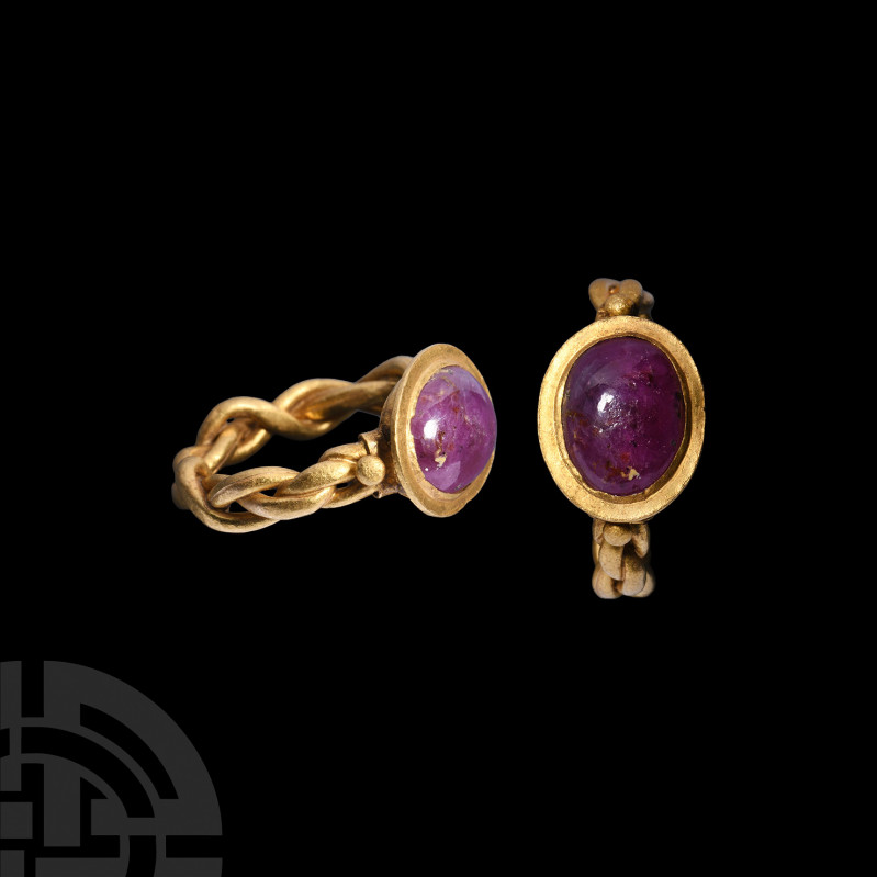 Roman Gold Ring with Ruby Gemstone. 1st century B.C.-1st century A.D. A gold rin...