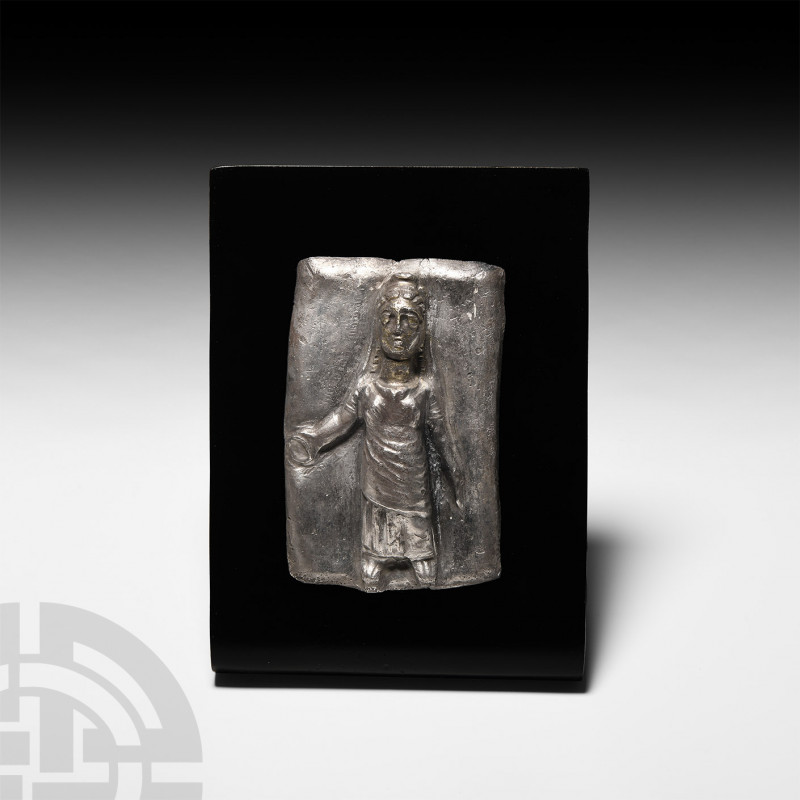 Roman Silver Plaque with Goddess. 2nd-3rd century A.D. A silver-gilt rectangular...