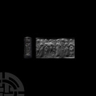 Old Babylonian Cylinder Seal with Presentation Scene. 2nd millennium B.C. A slender haematite cylinder seal bearing scene composed of standing male an...