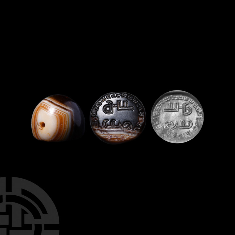 Sassanian Seal with Inscription. 3rd-7th century A.D. A plano-convex agate stamp...