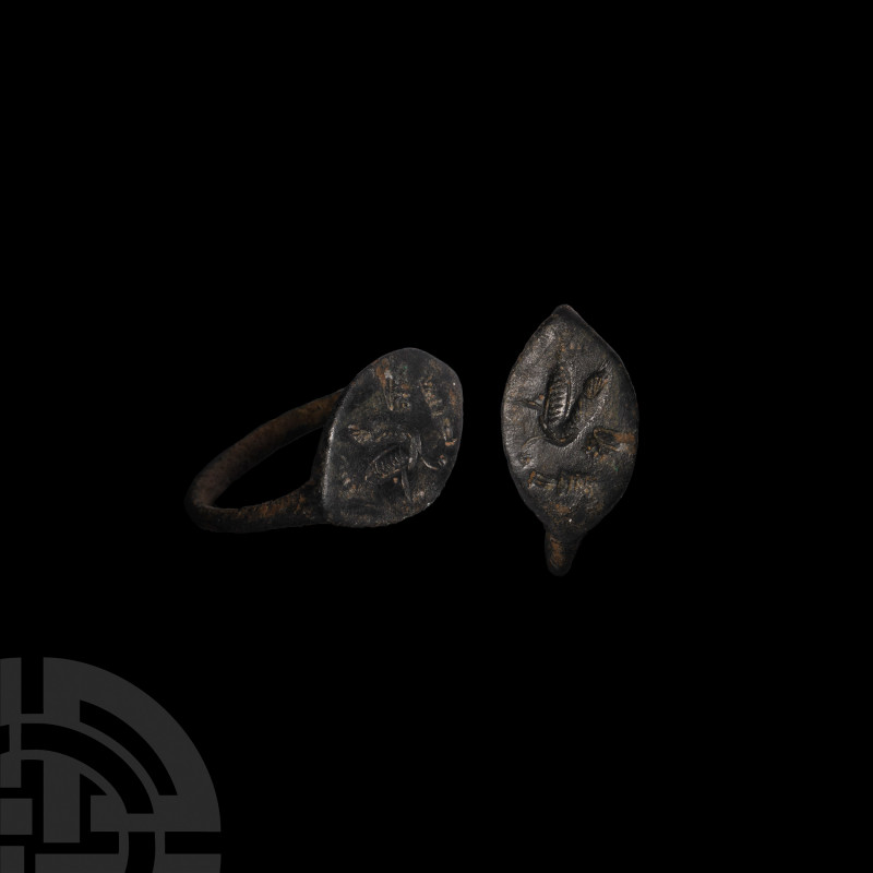 Greek Ring with Pegasus. c.450 B.C. A bronze ring with rounded hoop tapering tow...