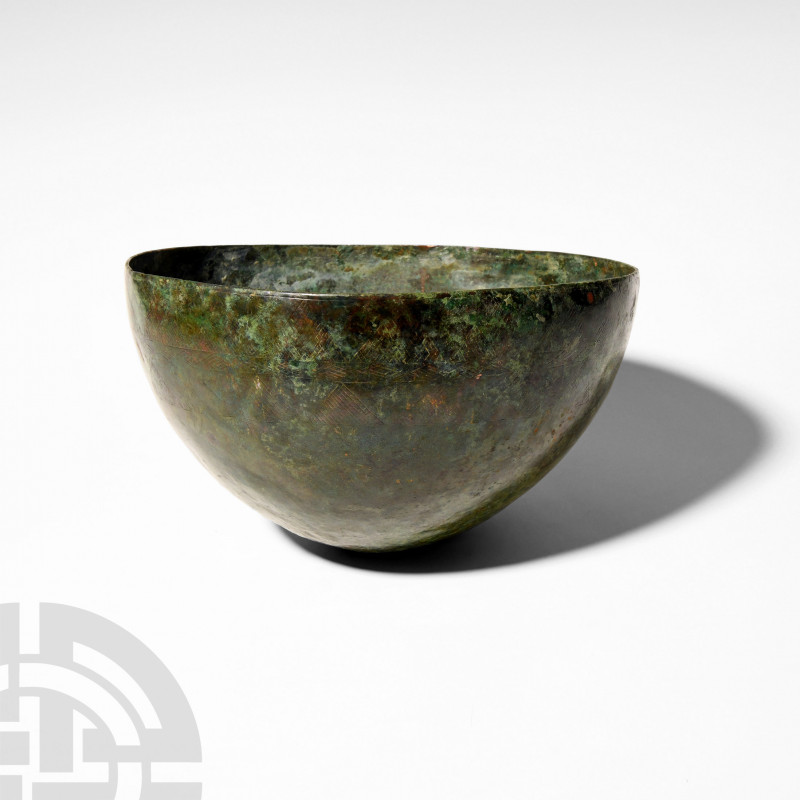 Luristan Bowl with Engraved Design. 13th-6th century B.C. A roughly hemispherica...