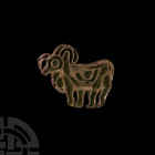 Central Asian Stamp Seal with Ram. 23rd-20th century B.C. A bronze compartmented seal in the form of a horned quadruped, with bulge to the chest, larg...