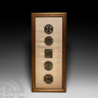 Stamp Seal Group. 3rd millennium B.C. A collection of five bronze stamp seals comprising mainly openwork designs: one with a scalloped circumference f...