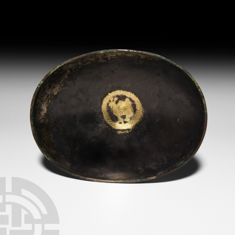 Sassanian Silver Bowl with Engraved Gilded Bird. 6th century A.D. A silver ellip...