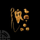 Greek Gold Artefact Collection. 5th-3rd century B.C. A group of gold artefacts mainly comprising jewellery components: a sheet-gold pendant with suspe...