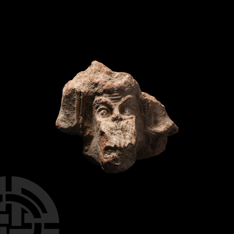 Hellenistic Brazier Fragment with Dionysus Mask. 2nd-1st century B.C. A terracot...