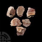 Roman Fresco Painted Wall Plaster Collection. 1st century A.D. A mixed group of coarse white wall plaster fragments from a fresco, with painted design...