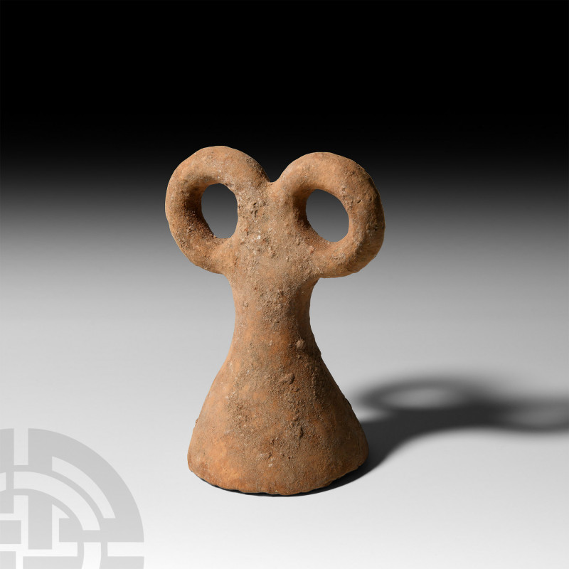 Mesopotamian Terracotta Eye Idol. c.3500-3000 B.C. A terracotta 'eye' idol with ...