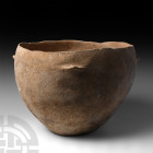 Very Large Holy Land Decorated Terracotta Bowl. 3000-2700 B.C. A large Bronze Age terracotta bowl with four small ledge handles. 3.5 kg, 34 cm (13 1/4...