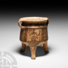 Cypro-Geometric Net-Painted Tripod Vessel with Warrior Figures. 11th-10th century B.C. A ceramic tripod with the main body decorated with four images ...