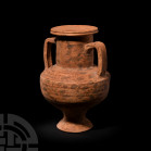 Large Nabataean Amphora. 3rd-1st century B.C. A large amphora with squat carinated body and broad shoulder, broad neck, stepped rim, integral handle a...